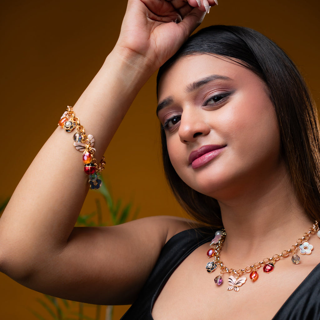 BUTTERFLY & FLORAL CHARM NECKLACE