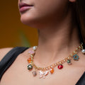 BUTTERFLY & FLORAL CHARM NECKLACE